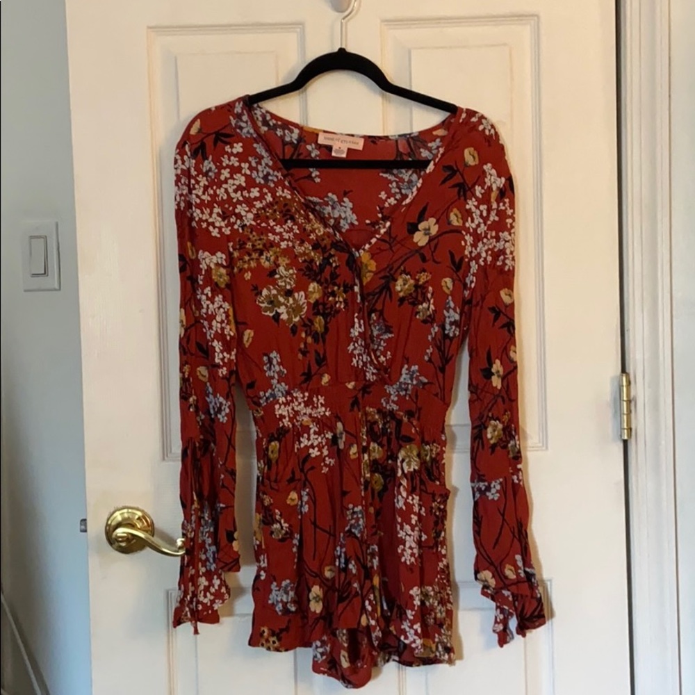 Romper with bell sleeves and pockets!